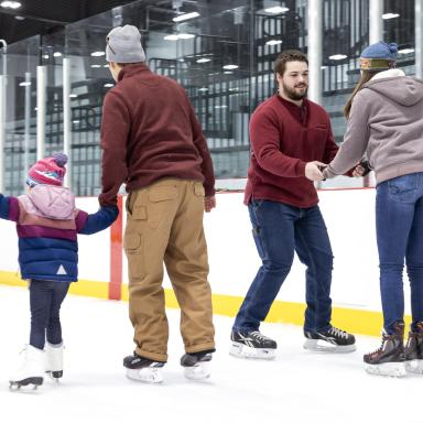 Family skating together.