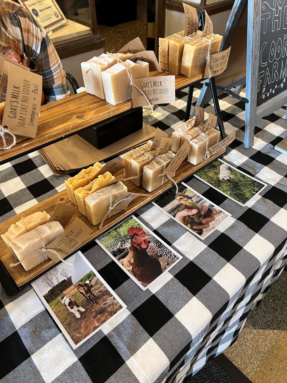 A table with a display of handmade soap.