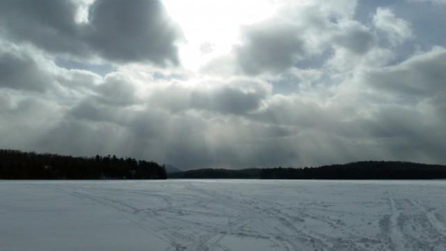Sun coming out on Lake Colby