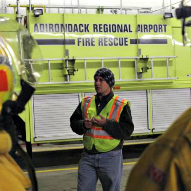 Corey Hurwitch, Airport Manager, goes over safety procedures