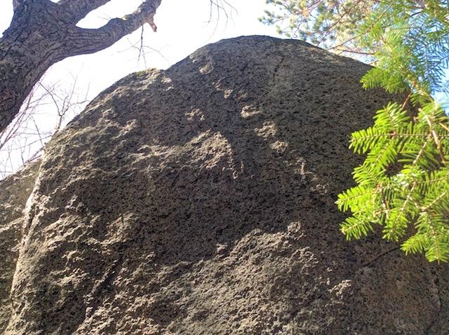 Some boulders are so tall they are popular with rock climbers practicing their moves and grips.