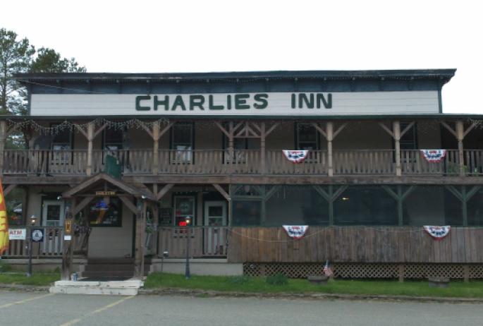 Camping in Charlie's Inn means access to the rooms, restaurant, tavern, and recreation areas at this former railroad destination