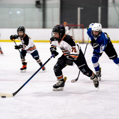 Youth hockey players in action on the ice