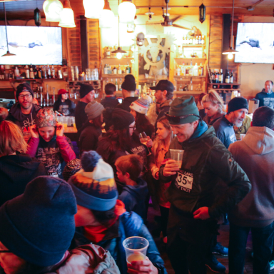mix of bar patrons in winter weather gear