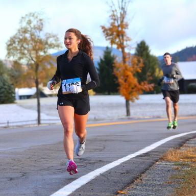 Runner in shorts on frosty fall morning