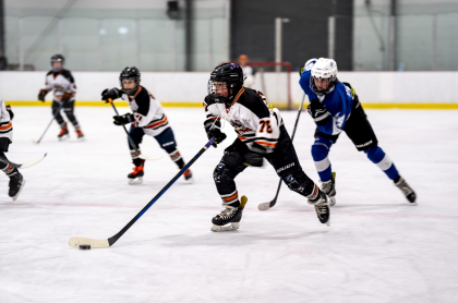 Youth hockey players in action on the ice