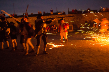 Revolutionary war reenactment at dusk
