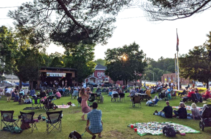 outdoor concert with a bandshell stage