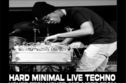 black and white photo with techno artist at table 