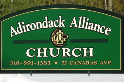 Green sign for the adirondack alliance church