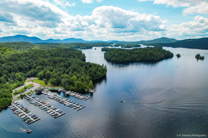 drone view of marina and lower saranac lake in the adirondack mountains