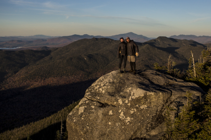 Two people on the summit of Seymour