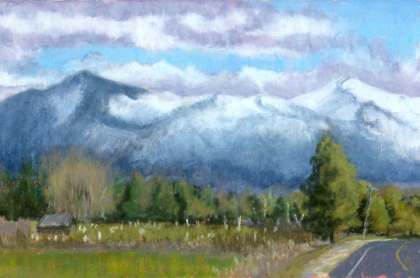 A pastel creation of a meadow and mountains.