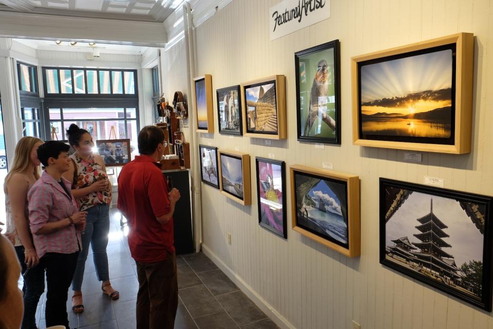 People viewing art at the Adirondack Artists Guild Gallery