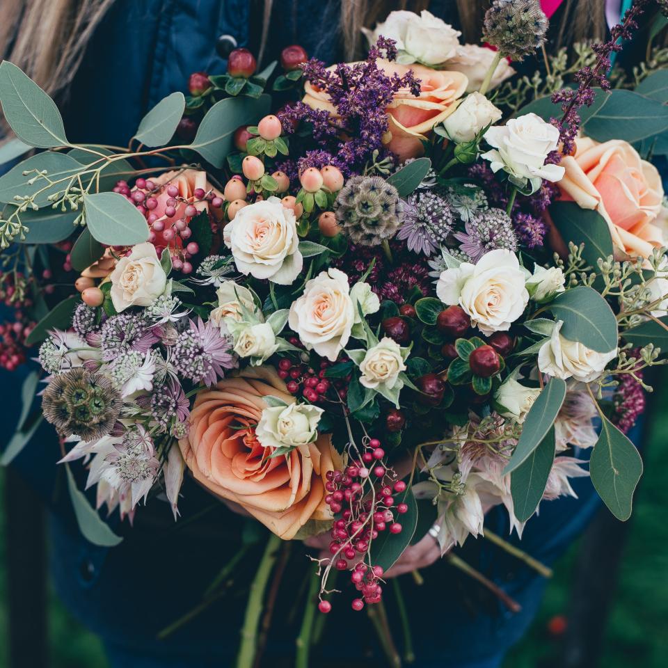 A close up view of a wedding bouquet.