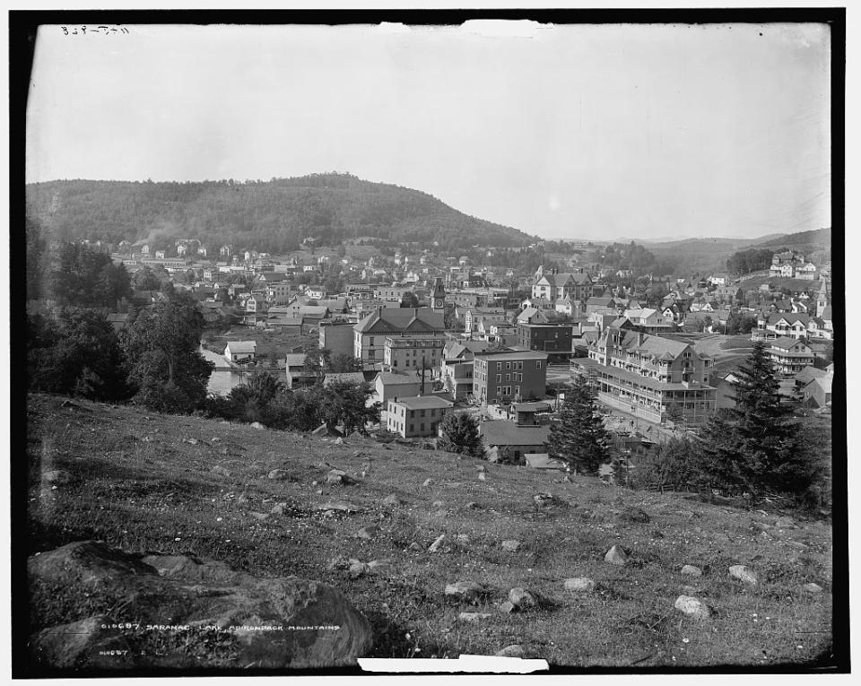 Black and white image, circa 1909, of Saranac Lake from Blood Hill.