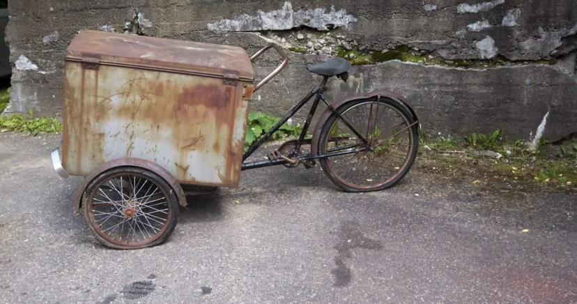 old, rusted ice cream cart