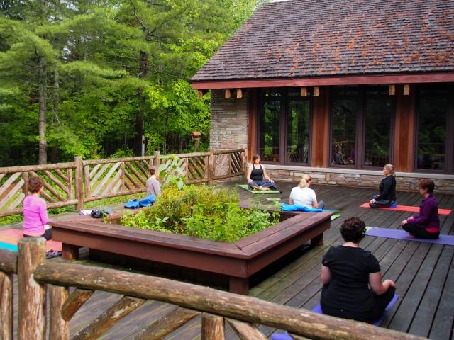 yoga on the deck at the Paul Smiths Visitor Interpretive Center