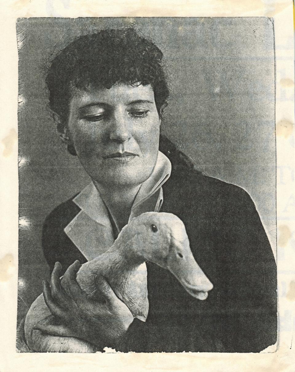 Portrait of Martha Reben with her pet duck, Mr. Dooley. Courtesy Historic Saranac Lake.