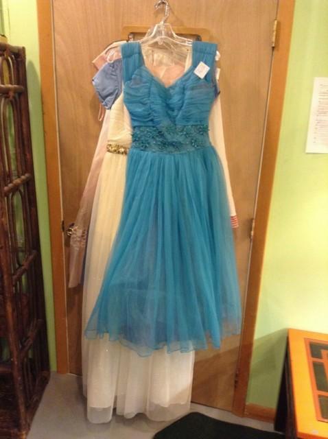 the section we first step into has some of the most interesting items, like cocktail gowns or opera cloaks