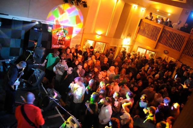 The crowded Waterhole Music Lounge enjoys the sounds of the Ominous Seapods during Carnival from February, 2011. Photo credit - Brandon Devito