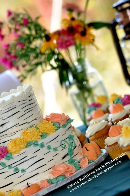 This clever birch bark design on the cake is only one of the many ways we make weddings unique! (photo Kathleen Keck Photography)
