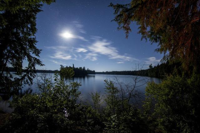 Linger until the moon rises at Follensby Clear Pond and experience "magic hour."