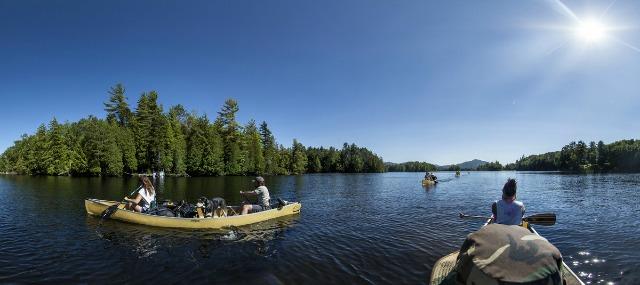 Canoeists paddle 90 miles from Old Forge in the Adirondack Canoe Classic - 90 Miler Race.