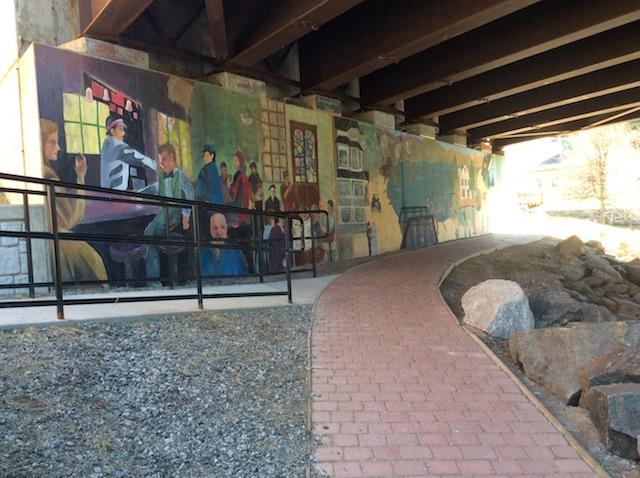 This mural under the traffic bridge is about who we are as a town.