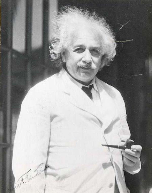 This autographed photo of Einstein shows one of his iconic brier pipes.