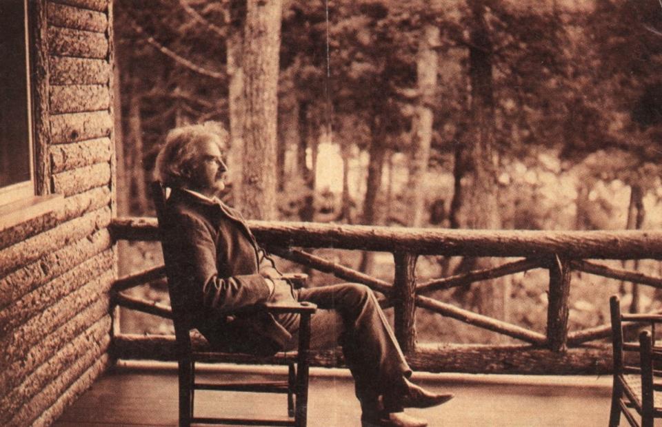 A sepia photo of Mark Twain on the porch at the Drury home. Photo courtesy Mark Twain Mapleworks.