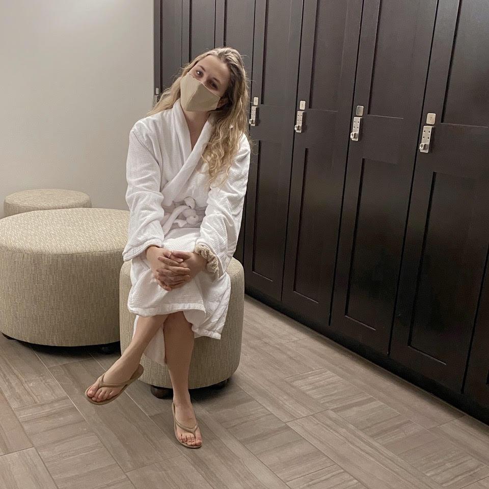 The author in a plush robe in the Ampersand Spa changing rooms.