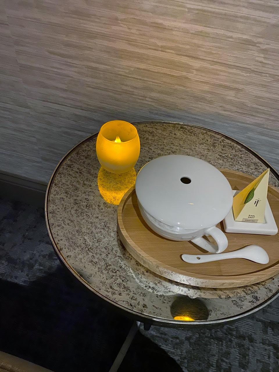 A small table of tea at the Ampersand Spa.