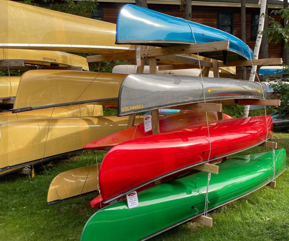 A rack full of canoes.