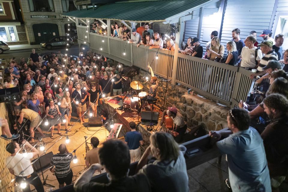 A party with live music on an outdoor patio