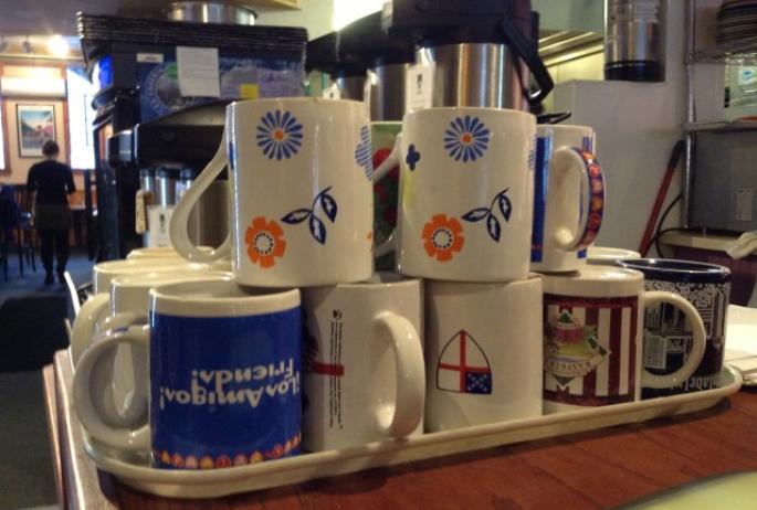 Eclectic coffee mugs at the Blue Moon Cafe in Saranac Lake, NY