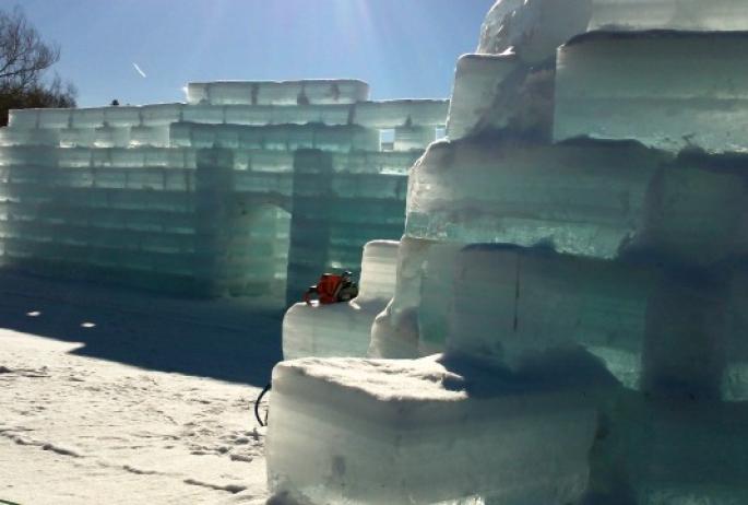 partially built Ice Palace rising from the lakeshore