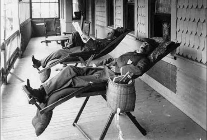 Patients gamely try to relax in their mattress-over-deckchair arrangement. (Note the Adirondack packbasket in foreground.)