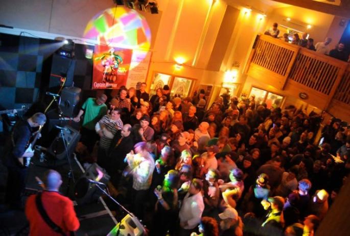 The crowded Waterhole Music Lounge enjoys the sounds of the Ominous Seapods during Carnival from February, 2011. Photo credit - Brandon Devito