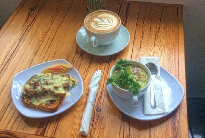 light, and delightful, fare: open-face grilled cheese with bacon and Dijon (l) chicken chili verde with avocado slices (r) cayenne mocha coffee (top)