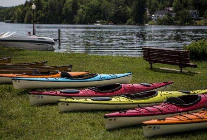 Paddle kayaks on Lake Flower. We saved you a seat!