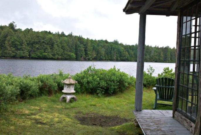 The teahouse sits on its own tiny island, reachable by a charming bridge. A wonderful place to enjoy the view of Osgood Pond.