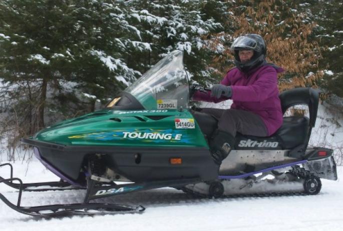 proper dress for snowmobiling and its high speed demands