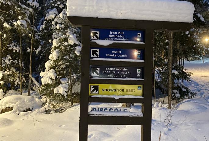 Signage at Dewey provides guidance on trail locations and difficulty.