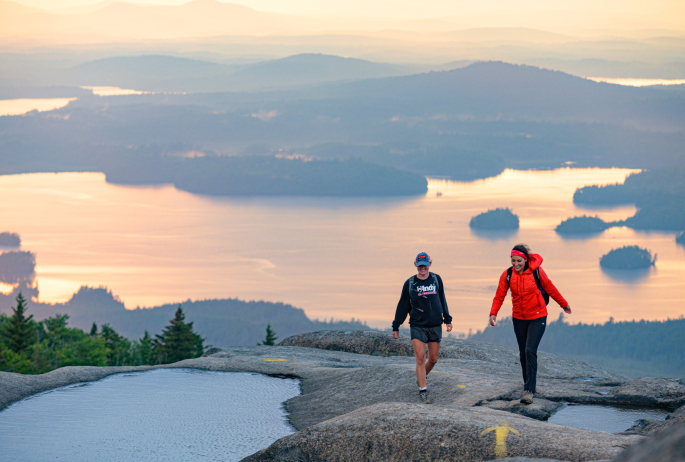 Two hikers on Ampersand Mountain
