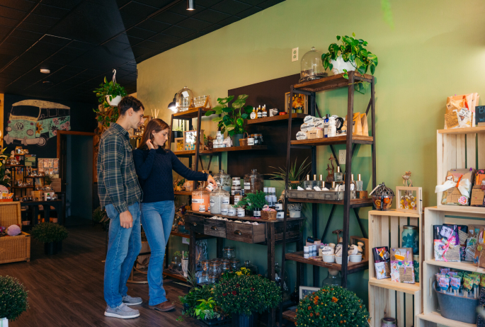 shoppers looking at selection on shelf
