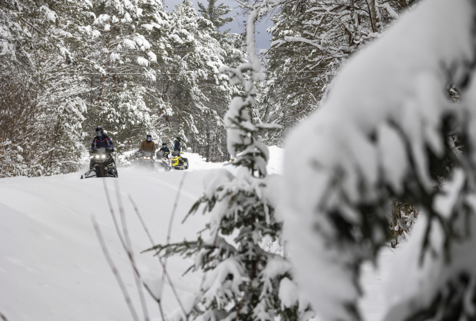 Snowmobilers on the Adirondack Rail Trail.