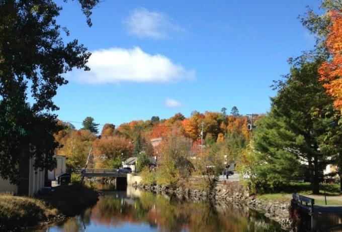 Saranac Lake Riverwalk with fall foliage on dislplay