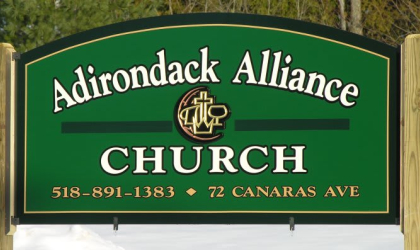 Green sign for the adirondack alliance church