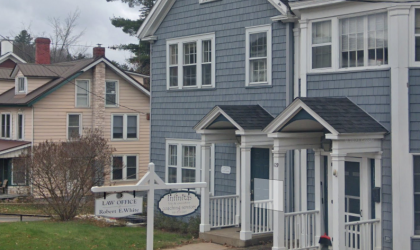 Blue & White exterior of Robert E White Attorney office